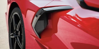 Close-up of the Rear of a Red 2025 Chevy Corvette Stingray with the Taillight On