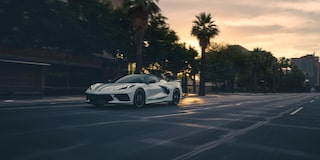 2025 Corvette Stingray Convertible Parked In Front of a Shop